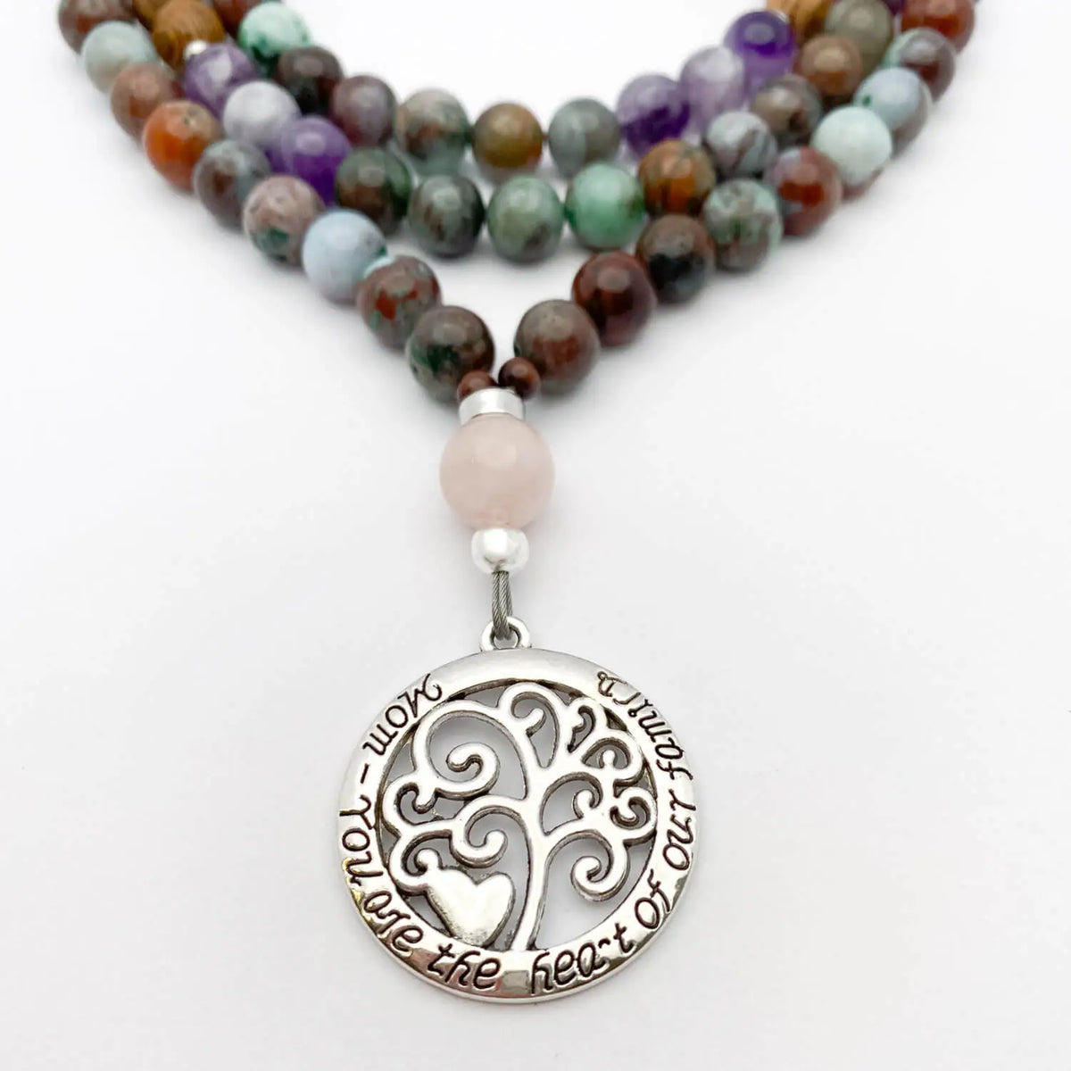 Closeup of pendant "Mom you are the heart of our family"